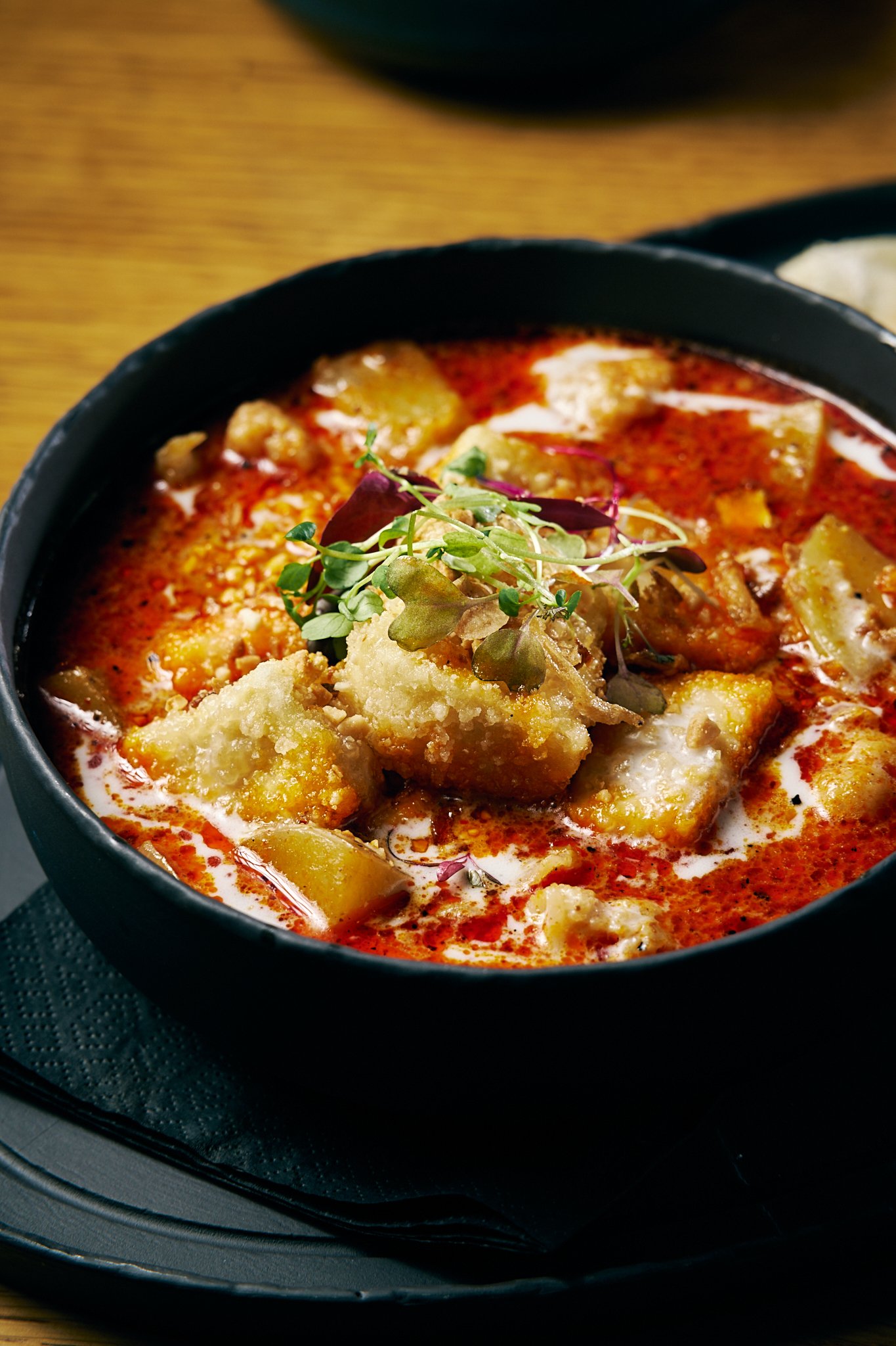 Tom Yum soup with prawns and fresh herbs